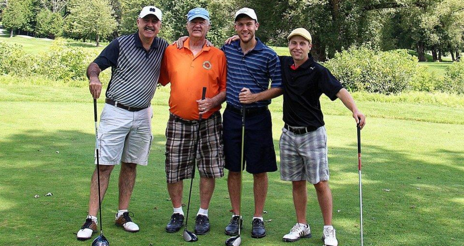 Blog image showing four golf players representing Wolf Golf Match is a social golf game